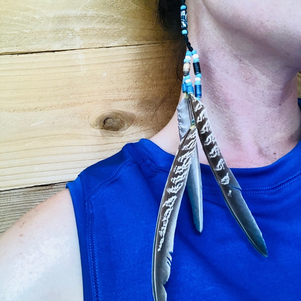 Handmade feather earrings with handmade beads